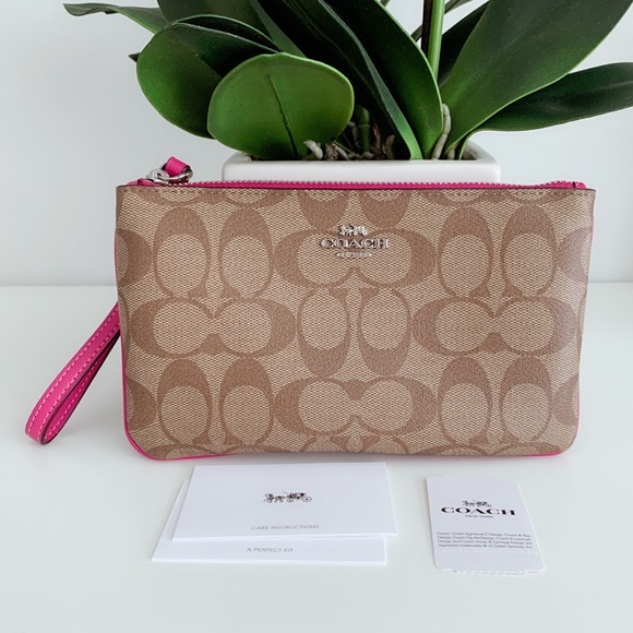 Coach Handbags - NWT Coach wristlet
